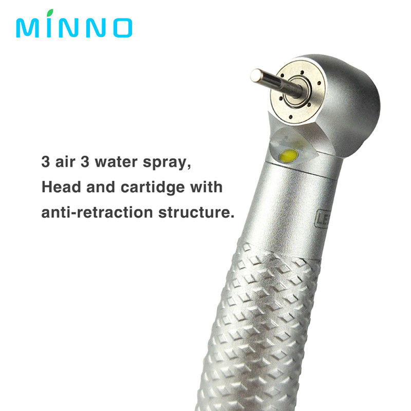 300000rpm Coxo de alta velocidad 4 agujeros LED de la mano dental con spray 3 Way